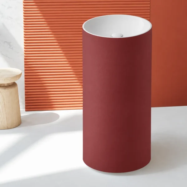 Ejemplo orientativo del lavabo Circo Sanycces con color exterior burdeos y cubeta blanca
