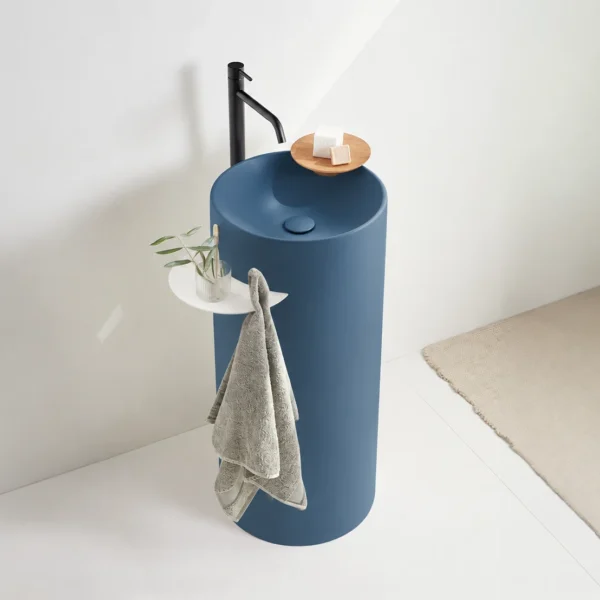 Lavabo Circo Joy en color integral azul orientativo con repisa izquierda blanca mate